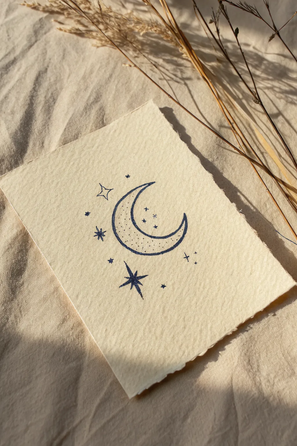 Minimal crescent moon and stars outline idea with bold contrast and cozy Scandinavian calm