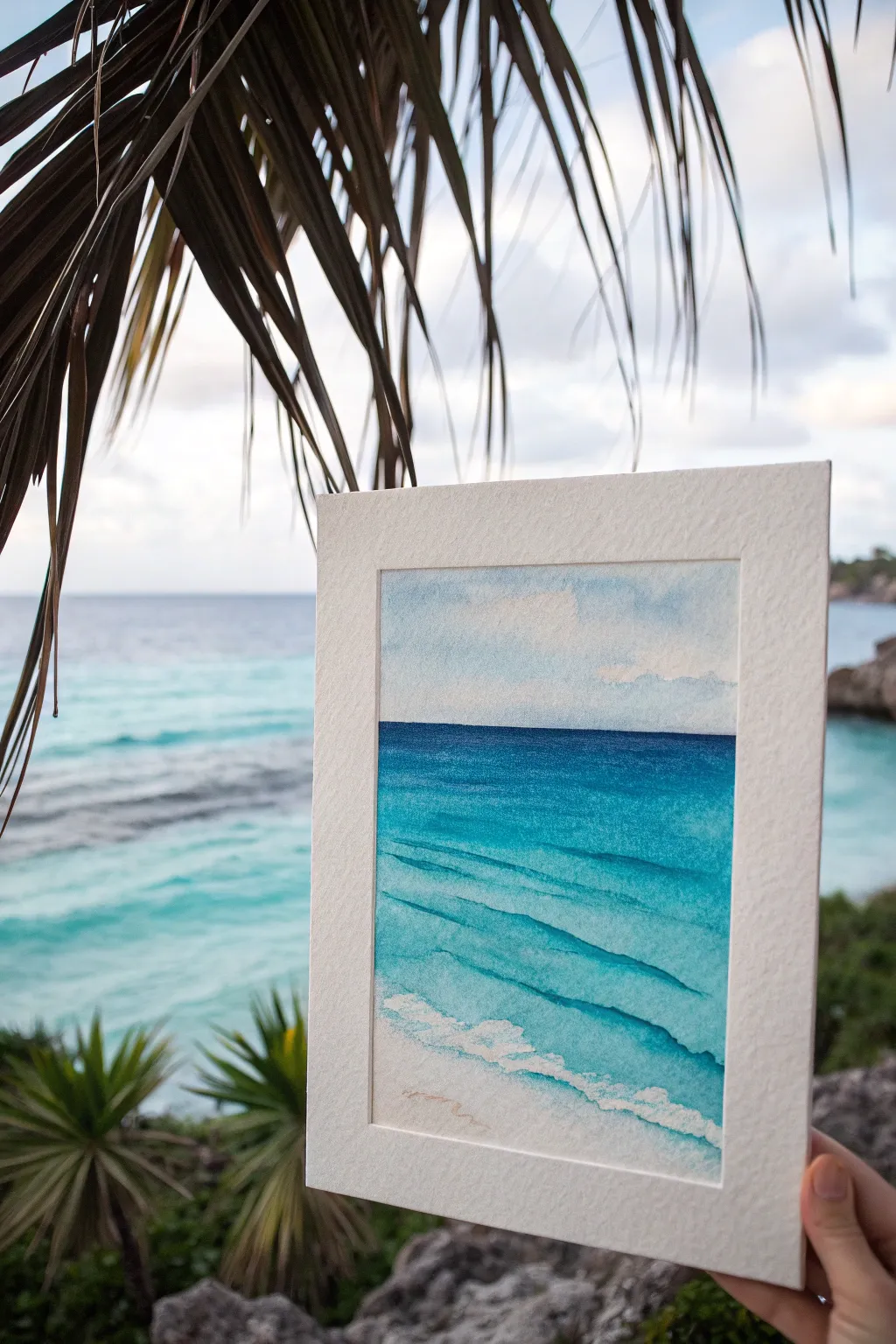 Easy ocean painting idea: minimalist sea horizon framed by bold palm fronds for contrast