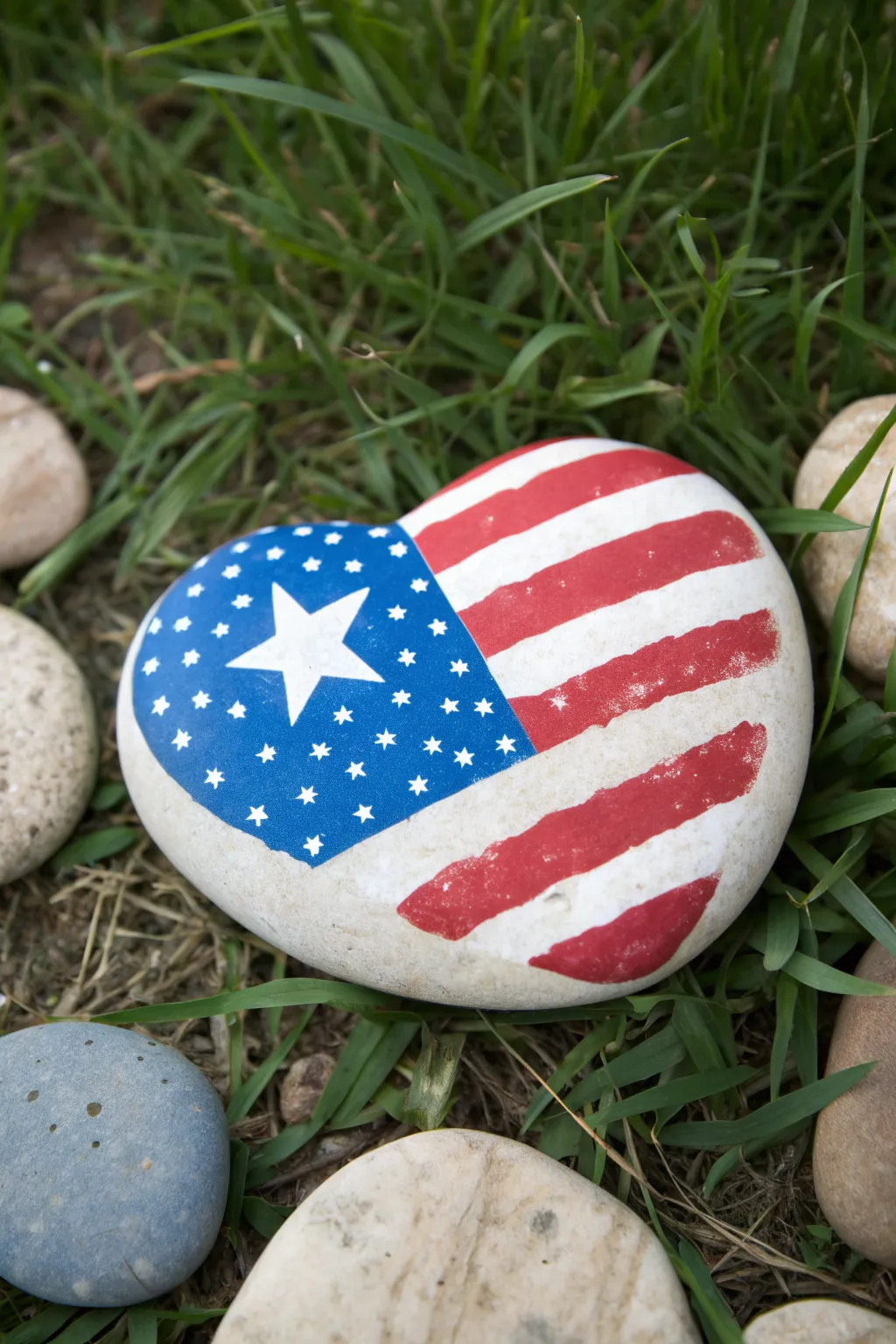 DIY patriotic heart flag rock with bold red, white, and blue for easy summer decor