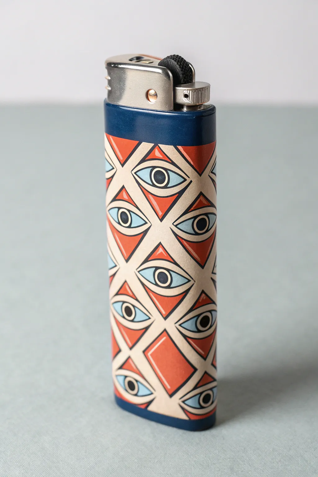 Bold stylized eye pattern turns a simple lighter into a chic Scandinavian-boho statement.