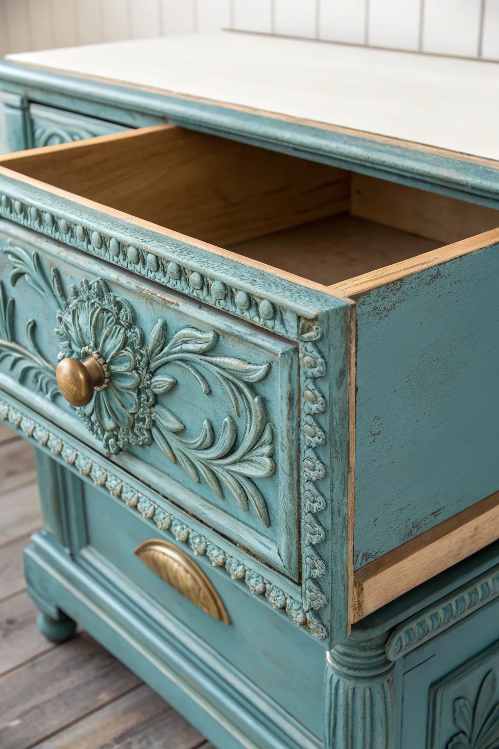 Antiquing glaze adds depth to carved trim for a beautifully timeworn painted vanity.