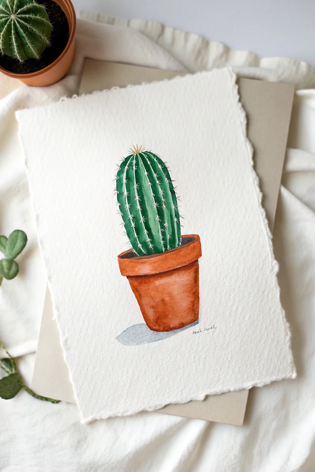 Try this simple potted cactus painting! A perfect beginner project to bring boho vibes home.