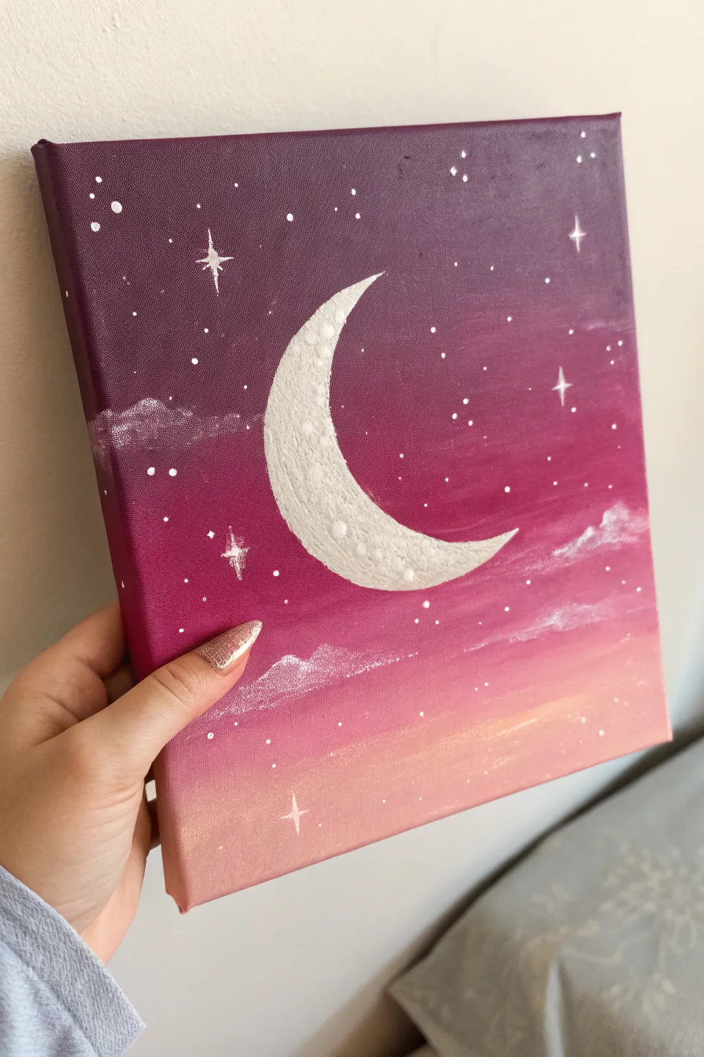 Dreamy crescent moon in a deep pink night sky, minimalist boho painting inspiration with bold contrast