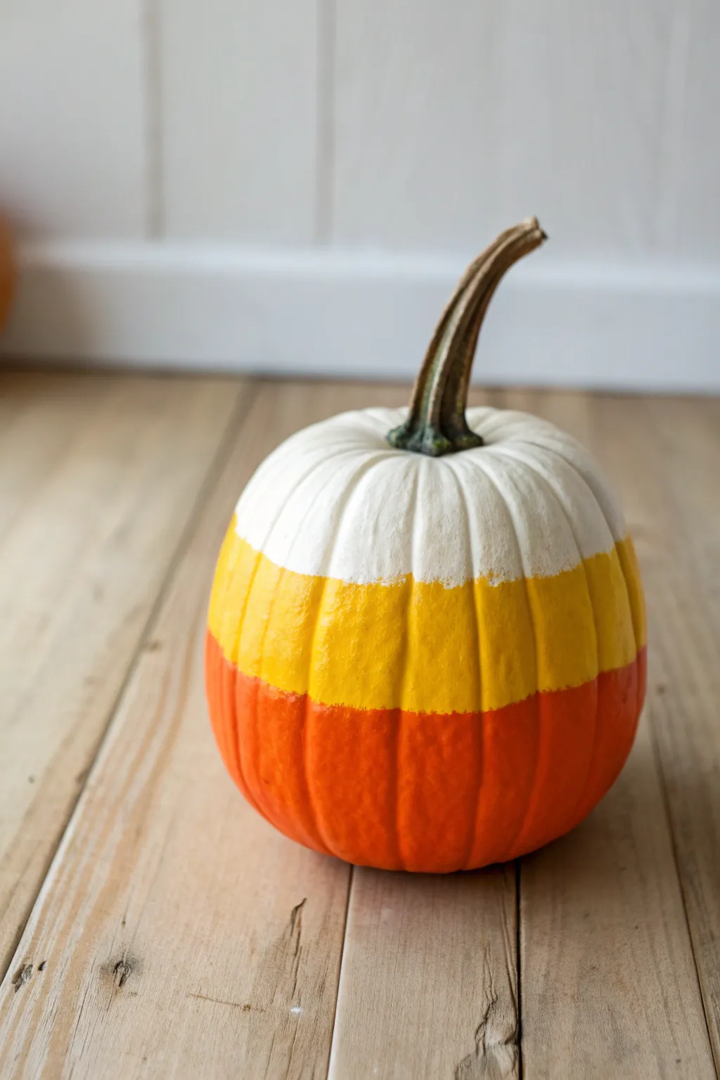 Candy corn ombre pumpkin with razor-sharp tape lines, minimalist boho styling for contest wow