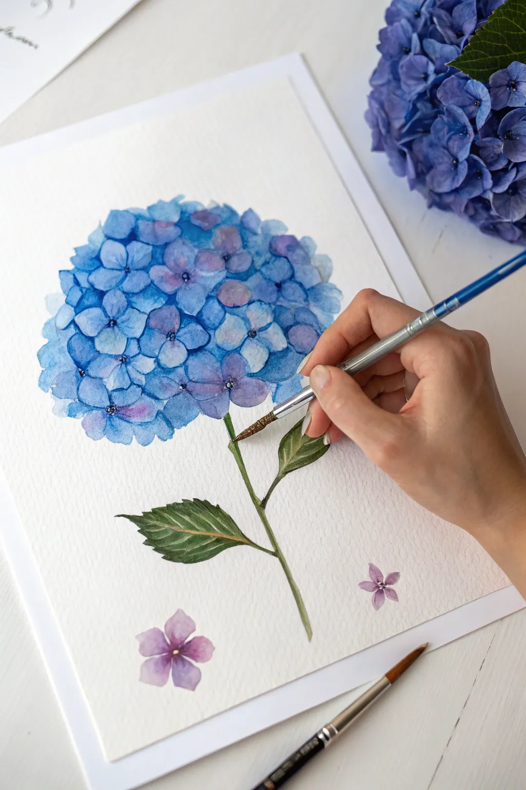 Simple hydrangea painting: tiny four-petal marks in bold blues and purples, easy to repeat