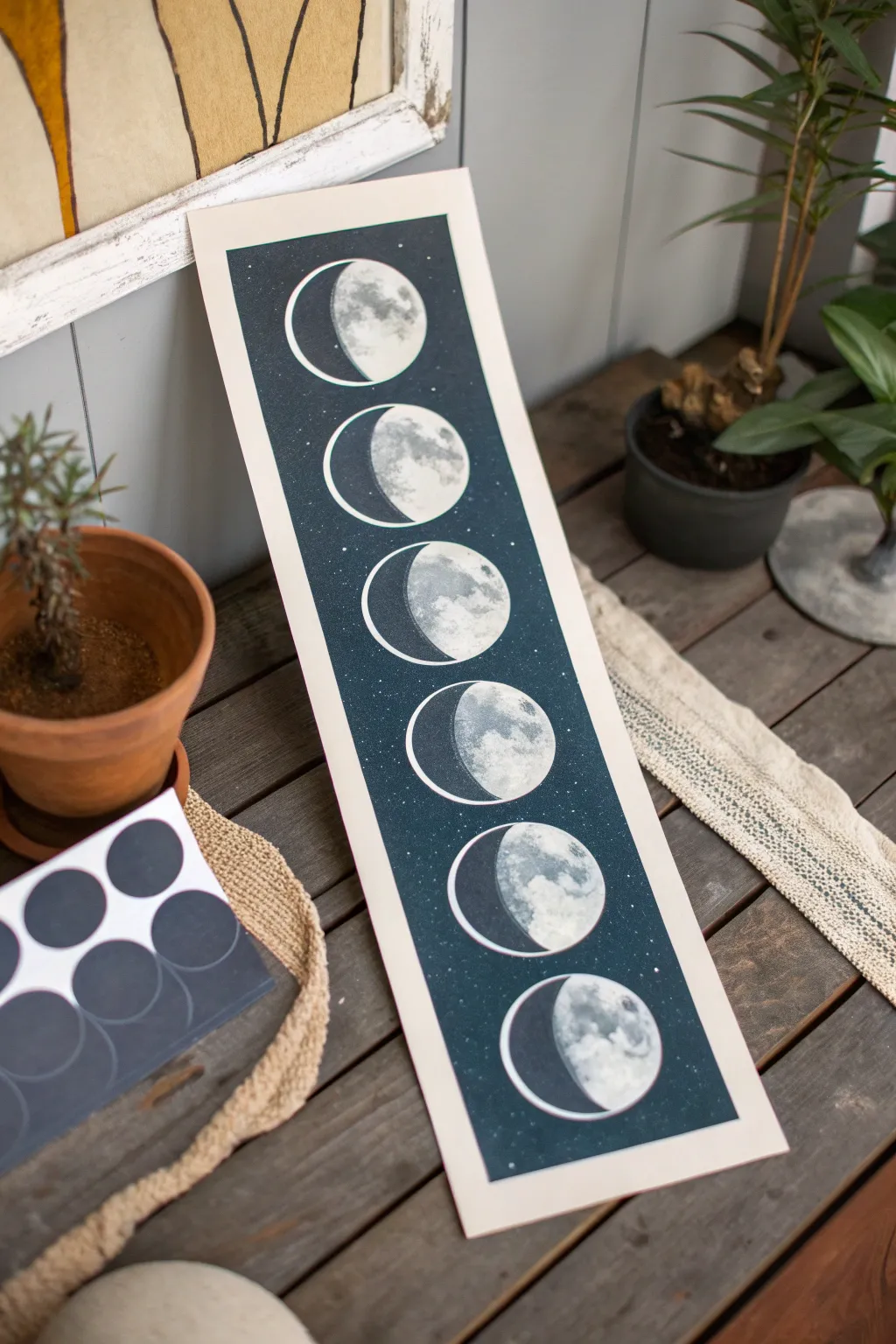 Minimal moon phase strip with spray paint shadows, an easy bold DIY art idea for your wall
