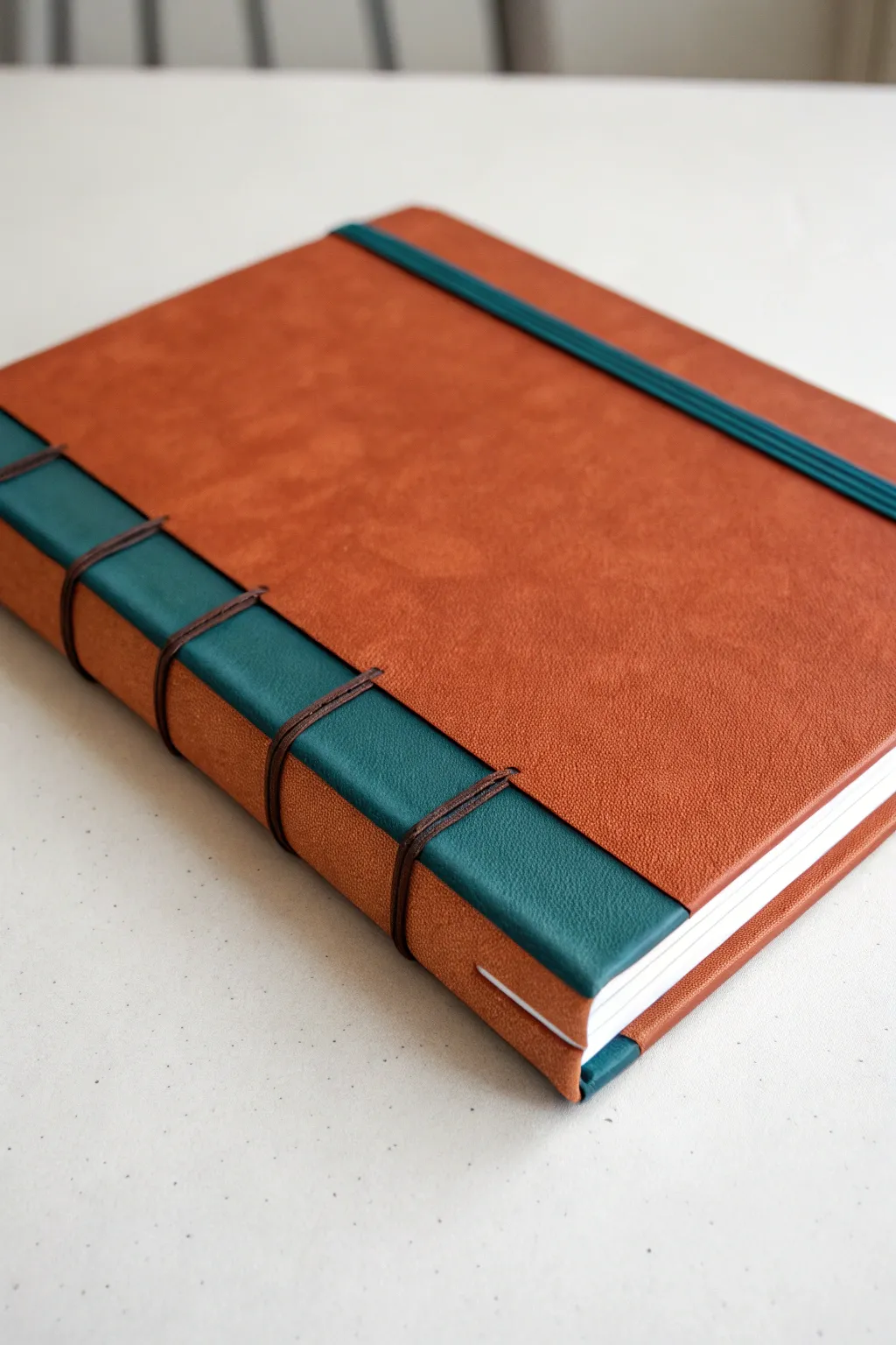 Paper-wrapped color block sketchbook cover with crisp edges and a sleek spine stripe detail