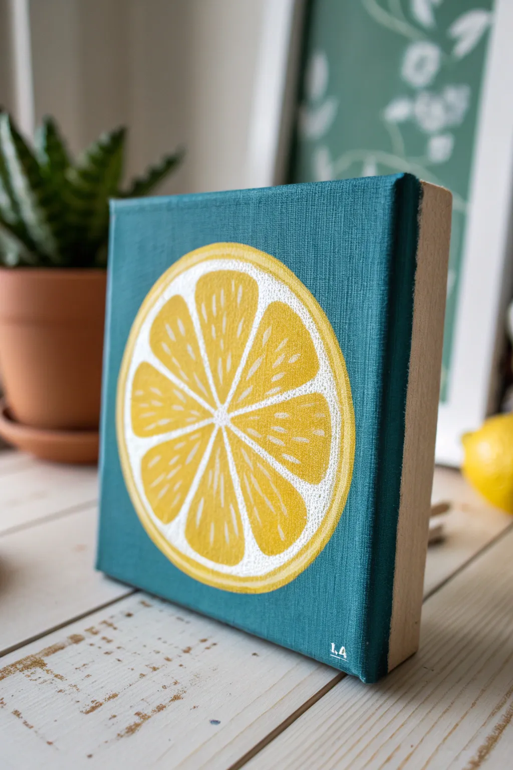 Beginner-friendly small canvas art: a bold lemon slice on a solid background for instant impact.