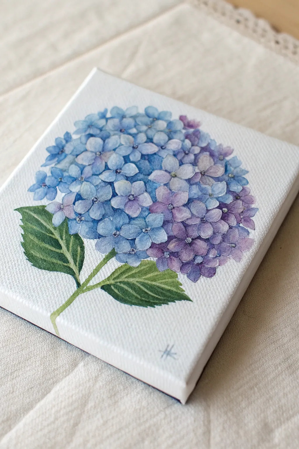 Tiny dotted hydrangea cluster in blues and purples, simple and soothing on a small canvas.