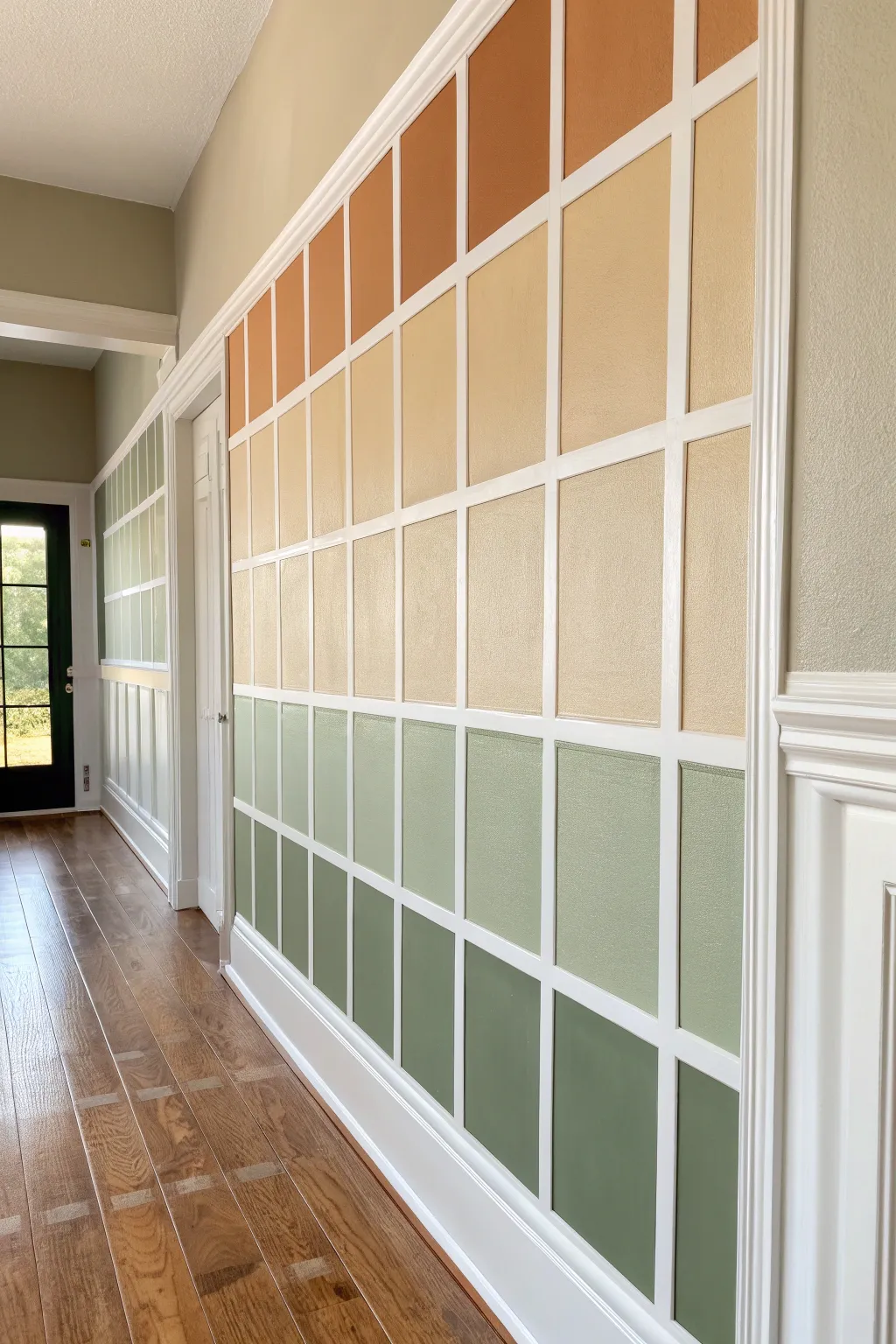 Painted color-block squares in earthy hues for a clean Scandinavian wall with boho warmth