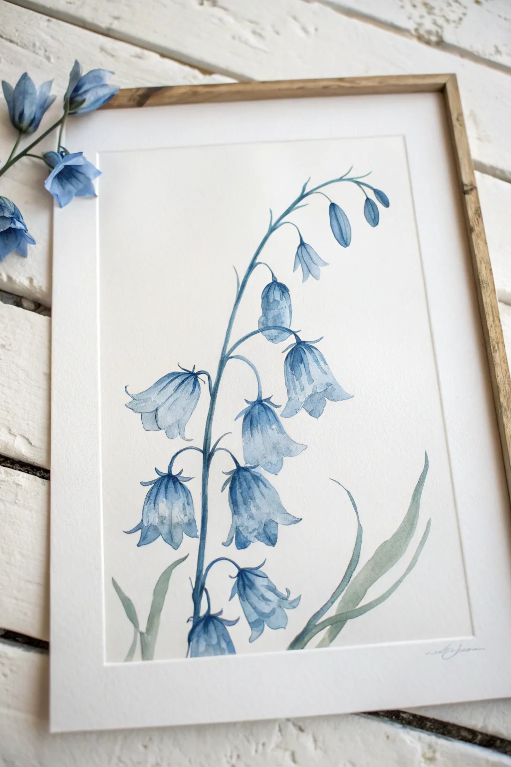 Cool monochrome bluebells in watercolor, airy washes and soft depth on clean white paper.
