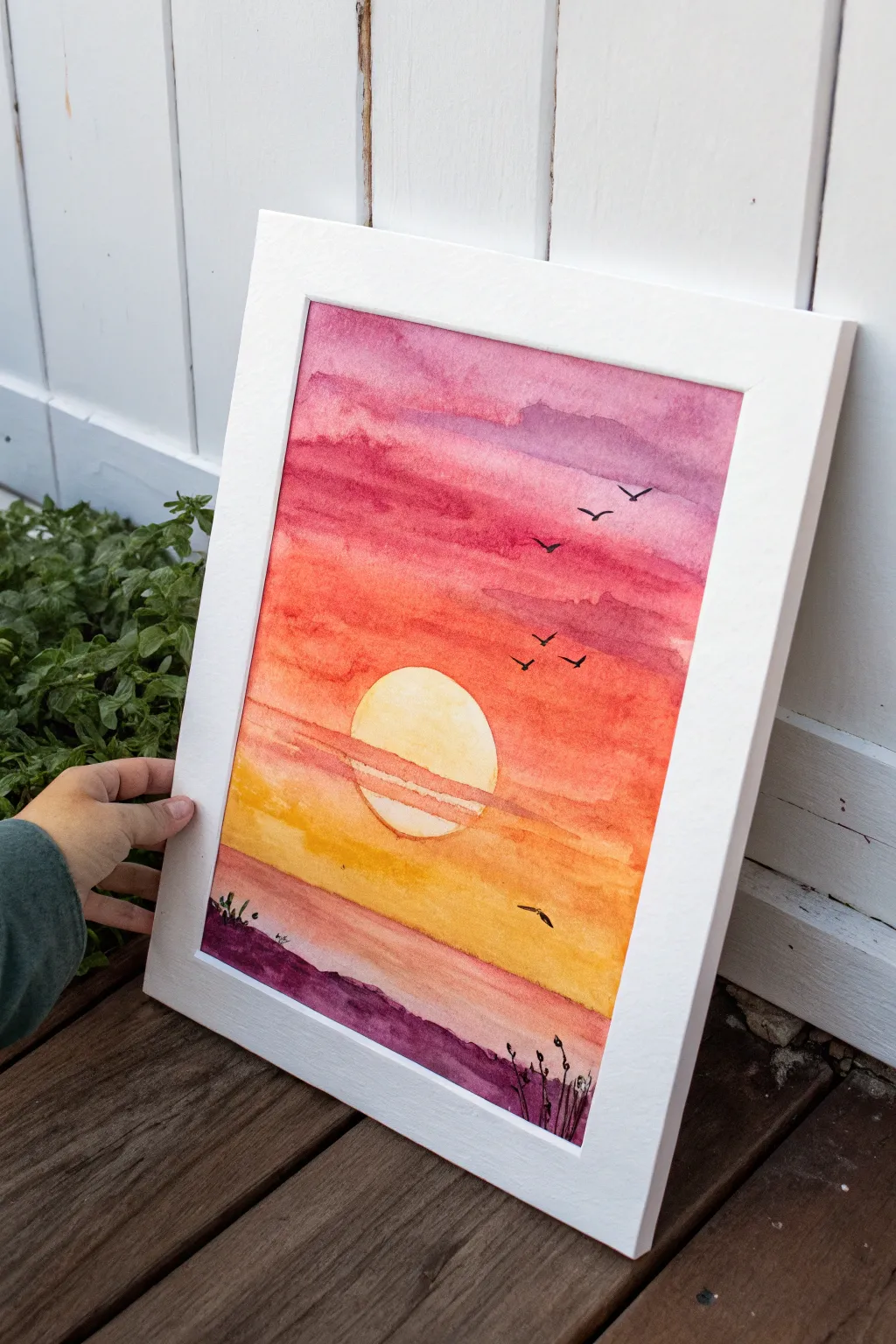 Simple sunset wash with tiny flying birds, bold gradients, and calming minimalist charm