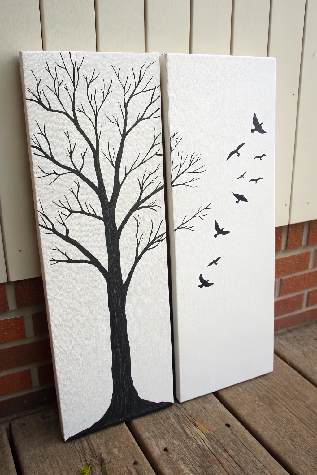 Minimal diptych: bold branch spans two canvases with birds gliding across the gap.