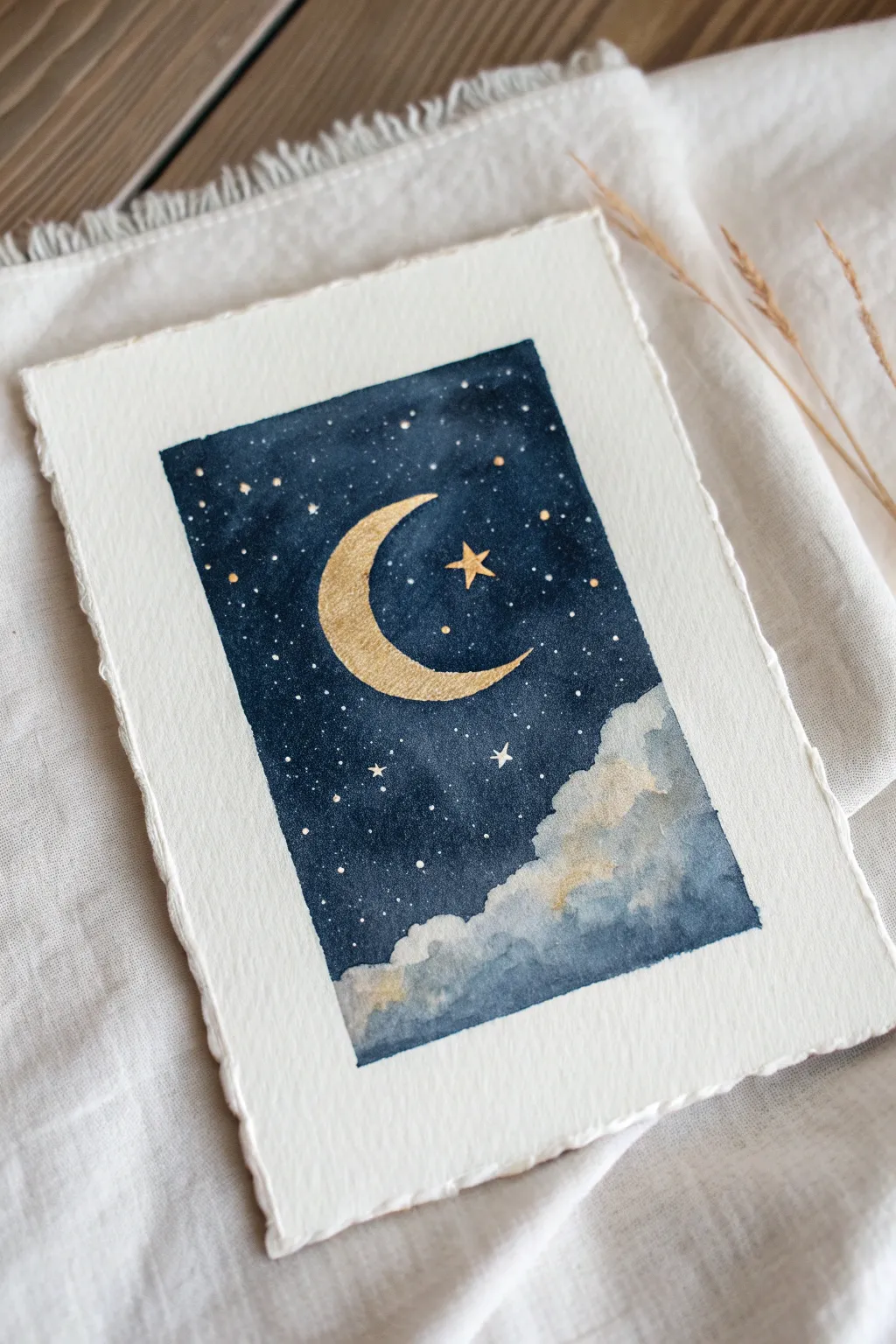 Three-color night sky: deep indigo wash, ivory moon, and one glowing gold star accent.