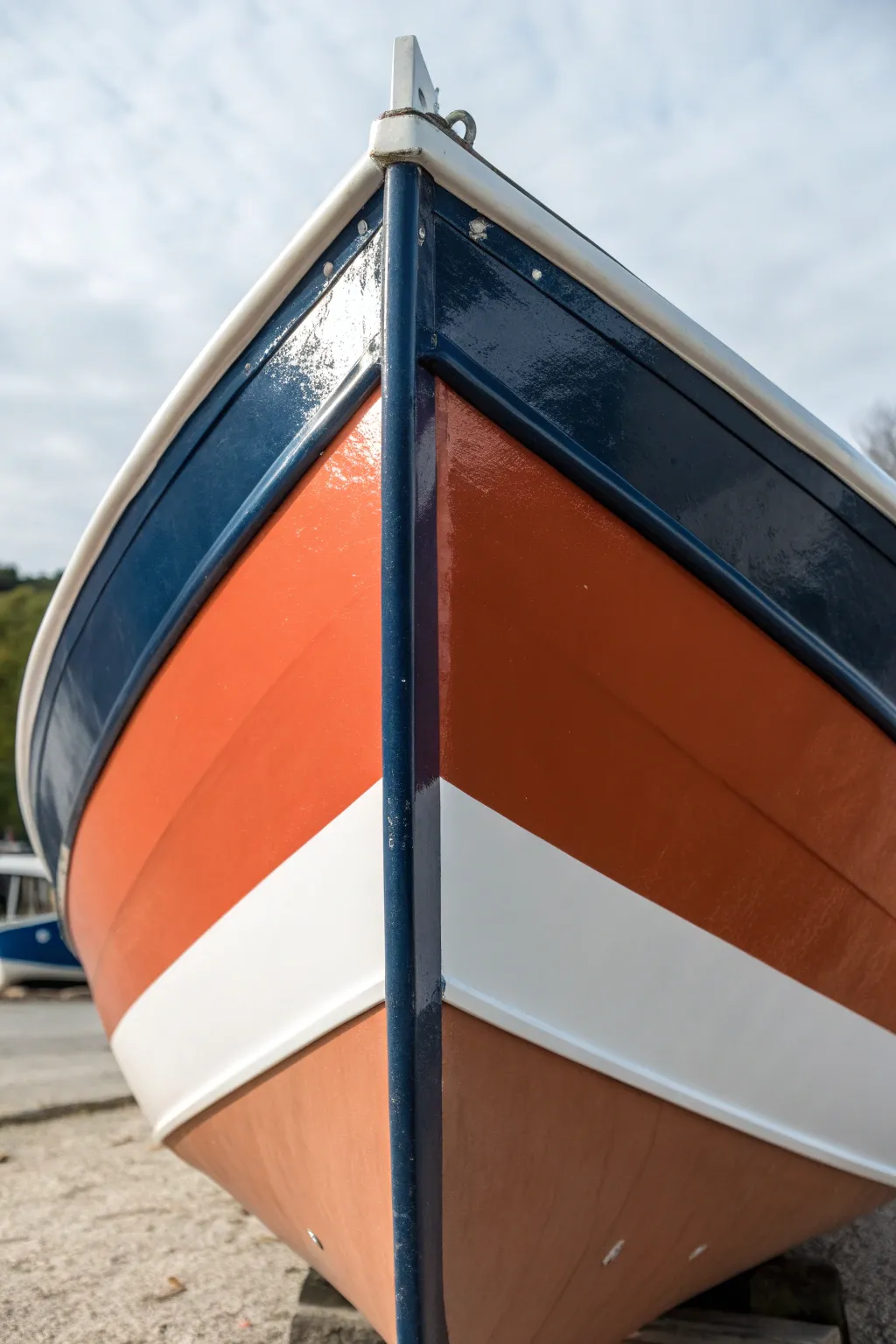 Bold color-block hull panels with crisp tape edges for a modern, minimal boat paint makeover.