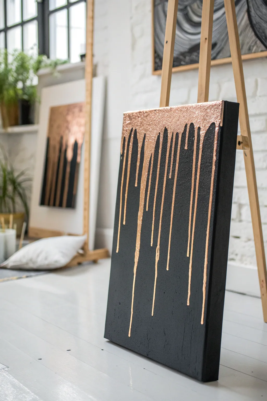 Dramatic metallic drips on a deep charcoal canvas for sleek, minimalist drip painting inspiration.