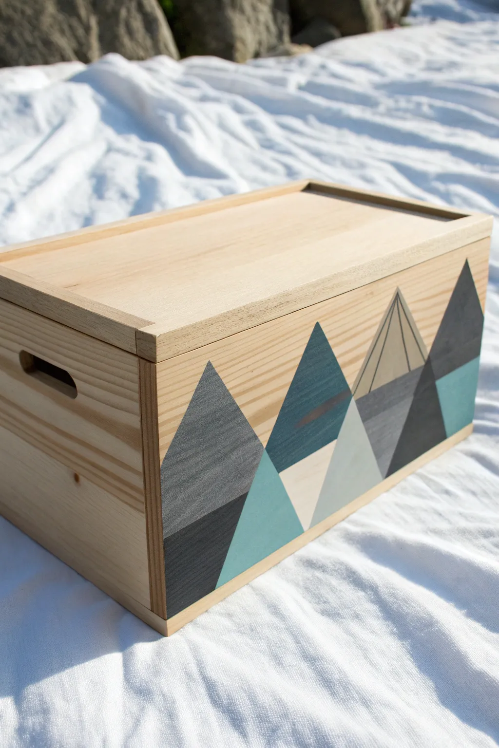 Transform a plain wooden box into decor with this easy minimalist mountain landscape design.