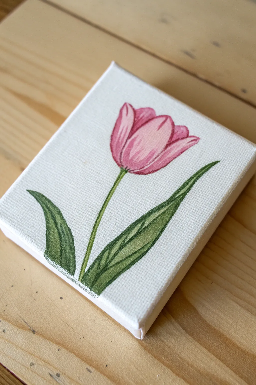 Beginner-friendly tulip on a tiny canvas, two-tone leaves in calm Scandinavian style.