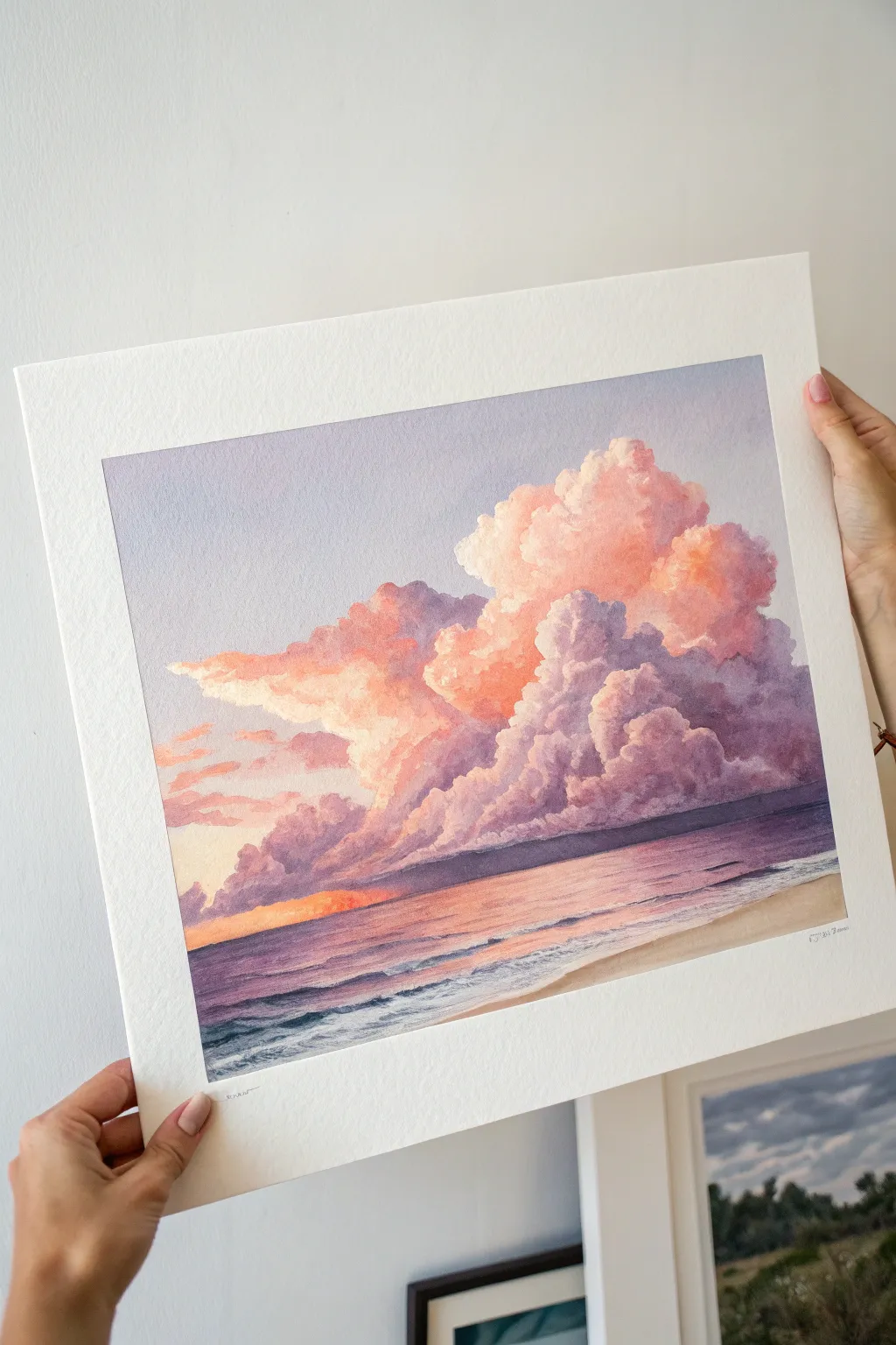 Paint cotton-candy sunset clouds over a calm ocean strip for an easy tropical watercolor vibe.