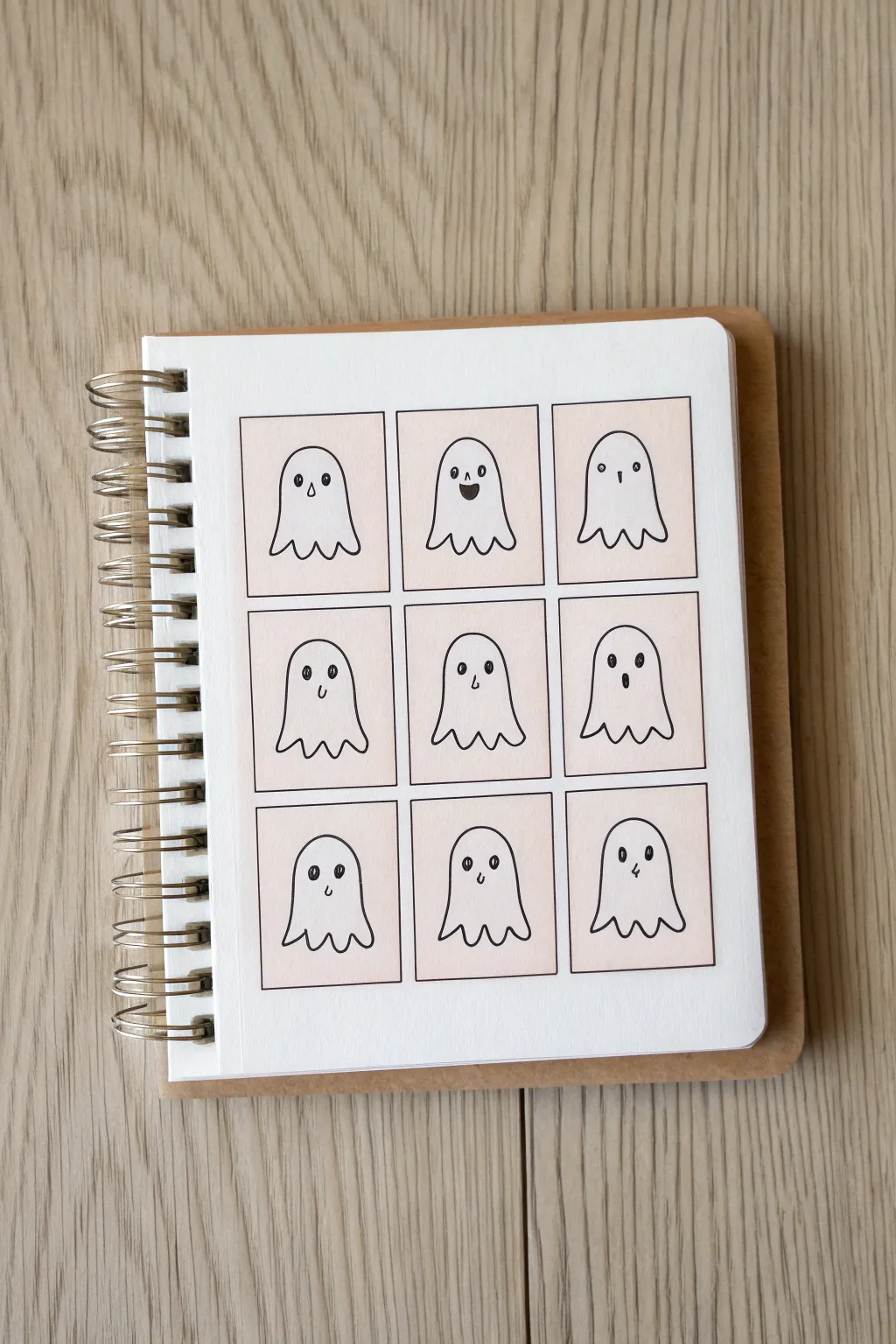 Mini grid of cute sheet ghosts with tiny arms, each showing a different emotion in ink.
