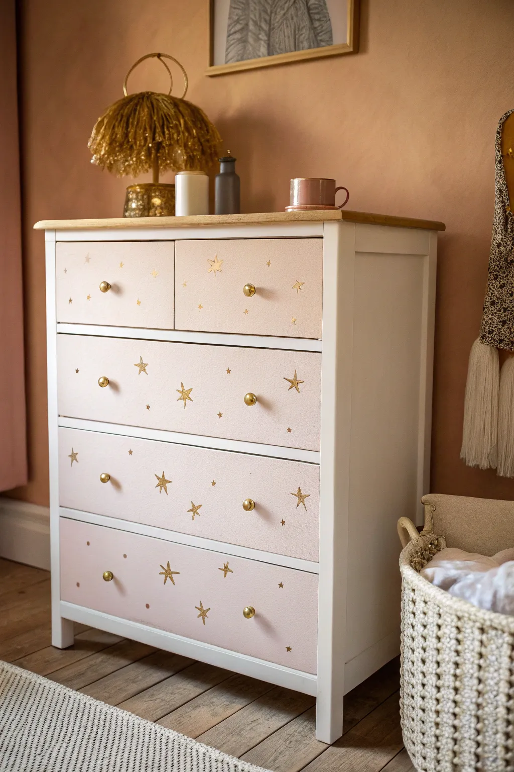 Pale girl dresser with tiny gold stars, warm cozy light, minimalist Scandinavian boho charm