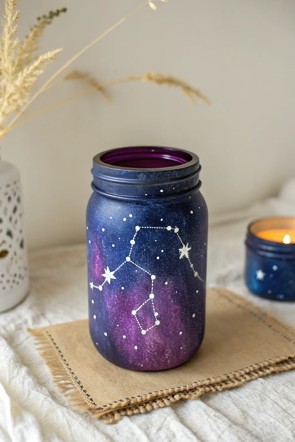 Capture the cosmos with this dreamy, hand-painted galaxy jar design.
