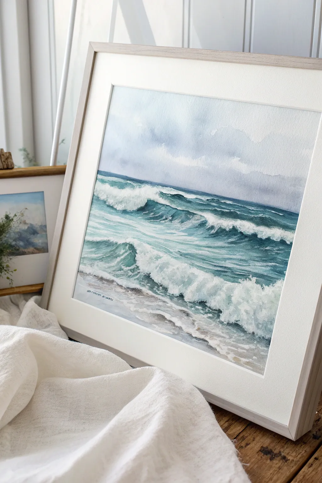 Coastal waves with bright foam and flowing brushstrokes for a calm, moody seascape study.
