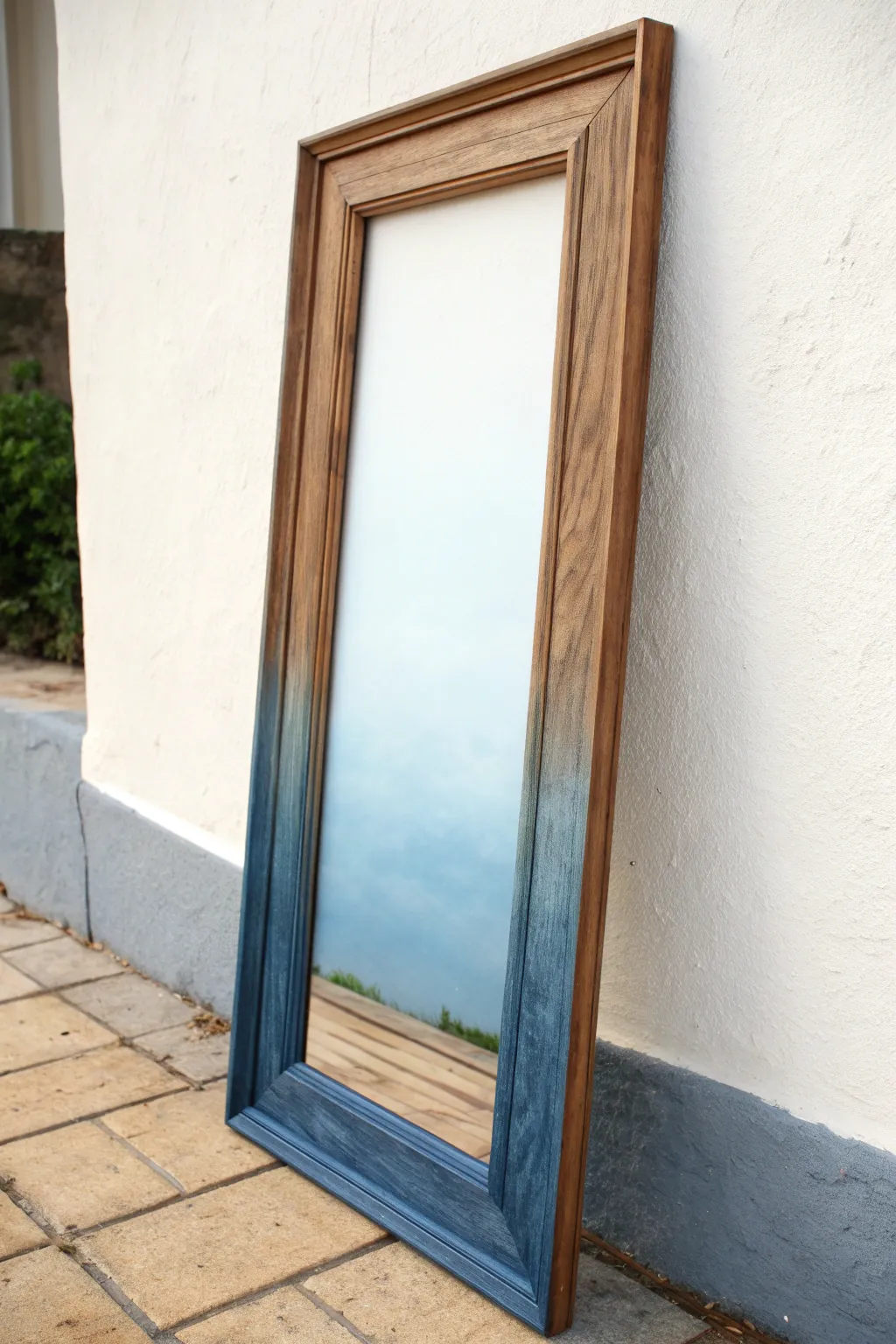 Transform your decor with this dreamy hand-painted navy to sky blue ombre frame.