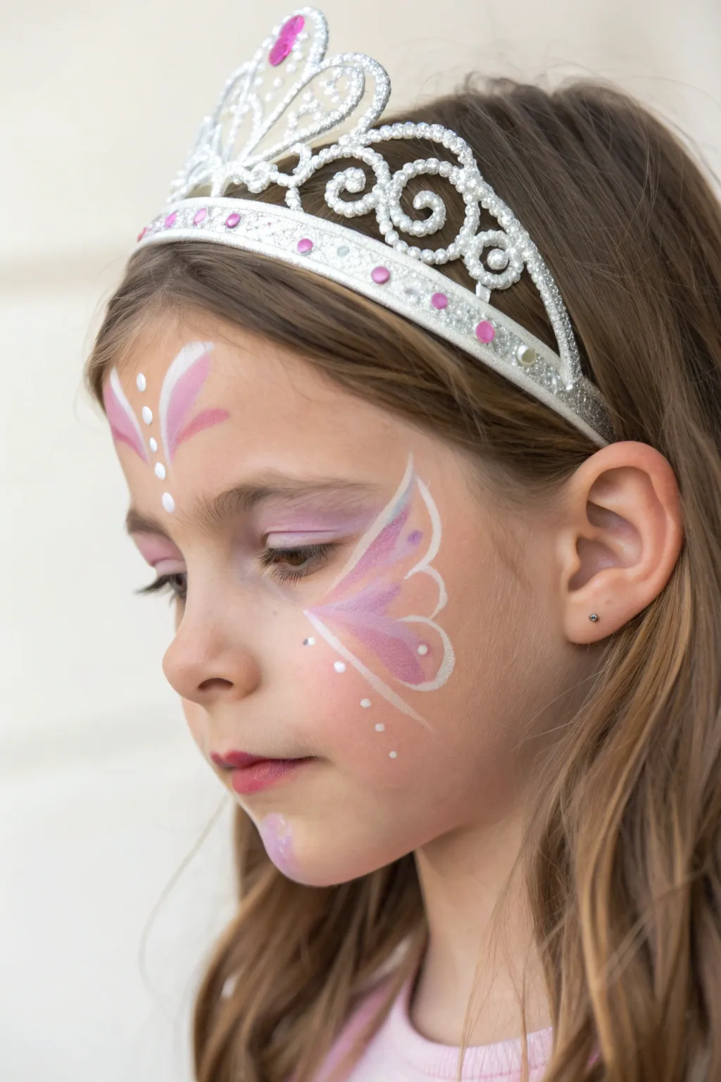 Butterfly crown wings in lavender and blush, a soft tiara face paint look with airy boho charm