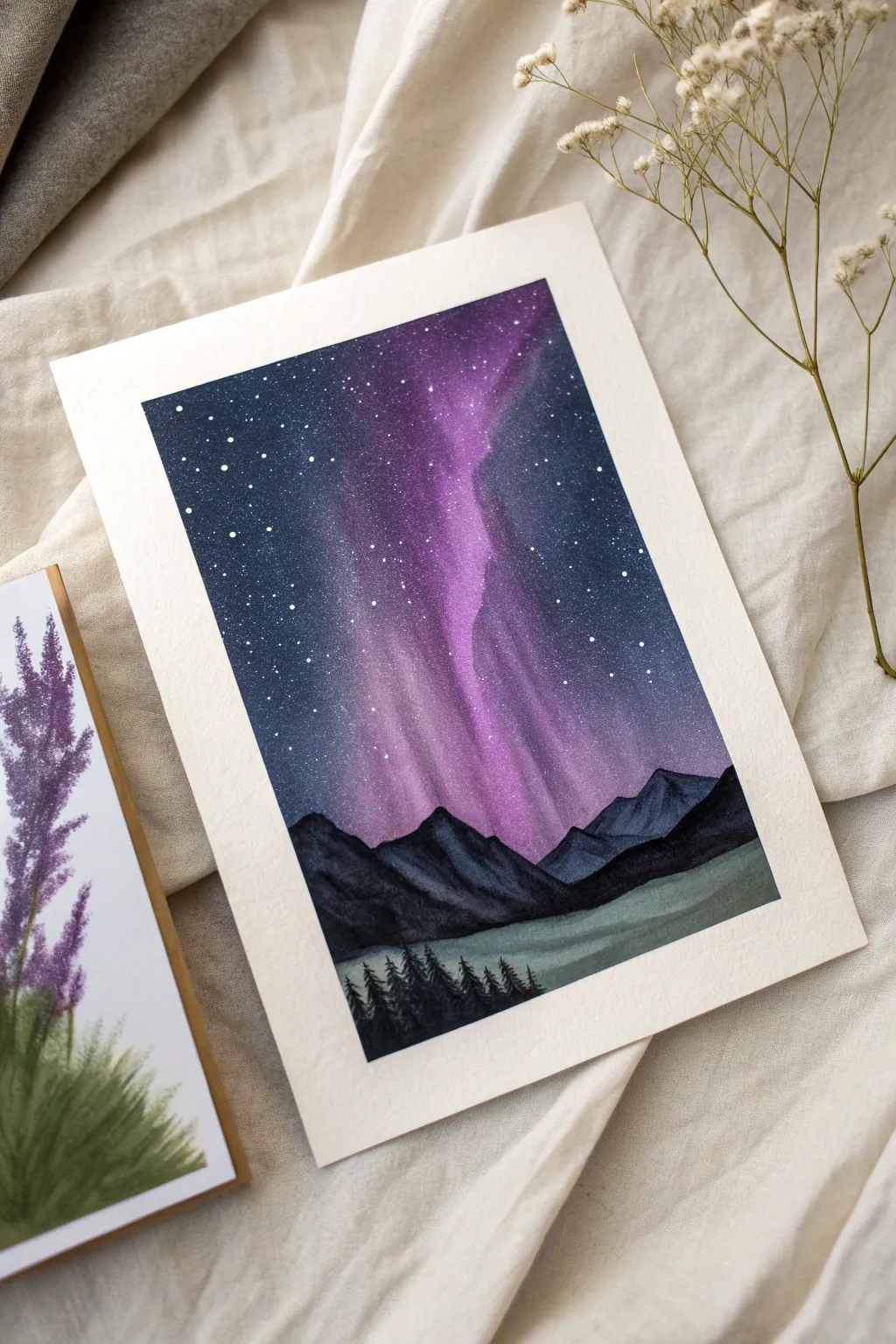 Minimal purple aurora painting over a dark ridge, soft glow reflecting on snowy peaks