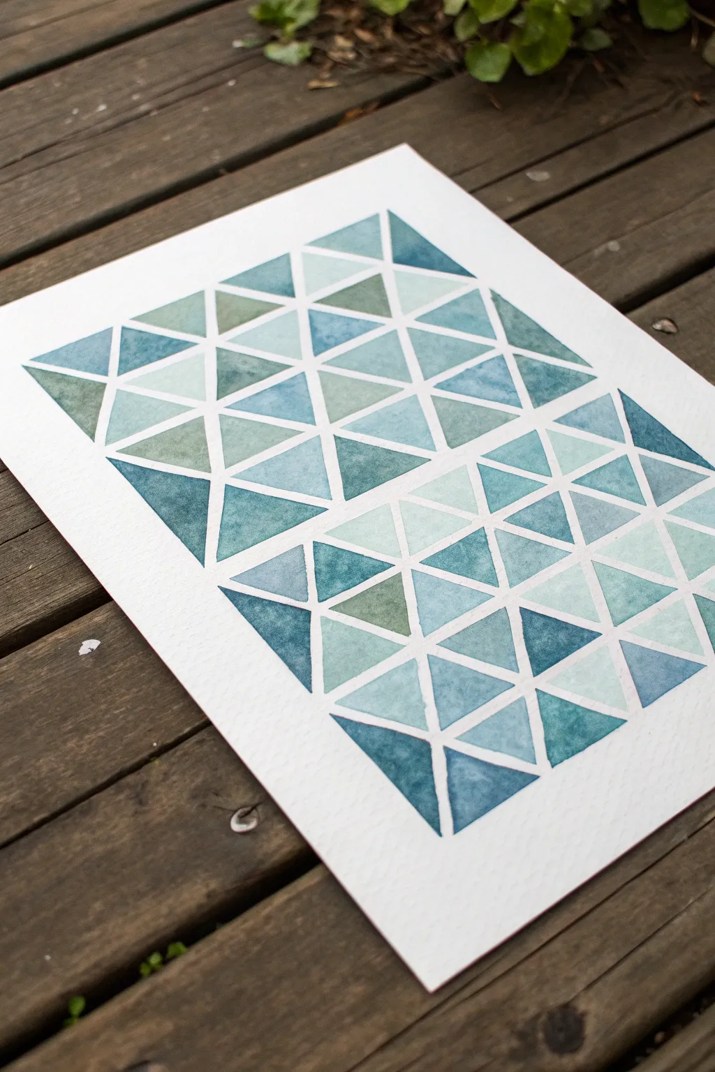Triangle mosaic watercolor washes with crisp white gaps for modern minimalist abstraction