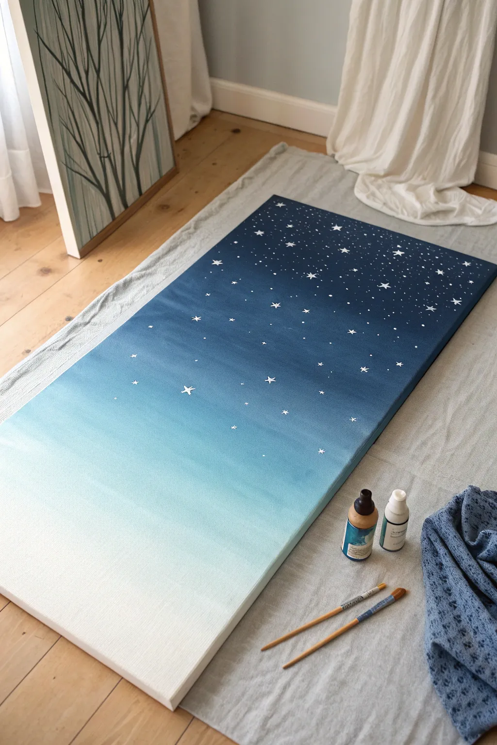 Easy big-canvas ombre night sky with splatter stars, minimalist and calming in navy blues