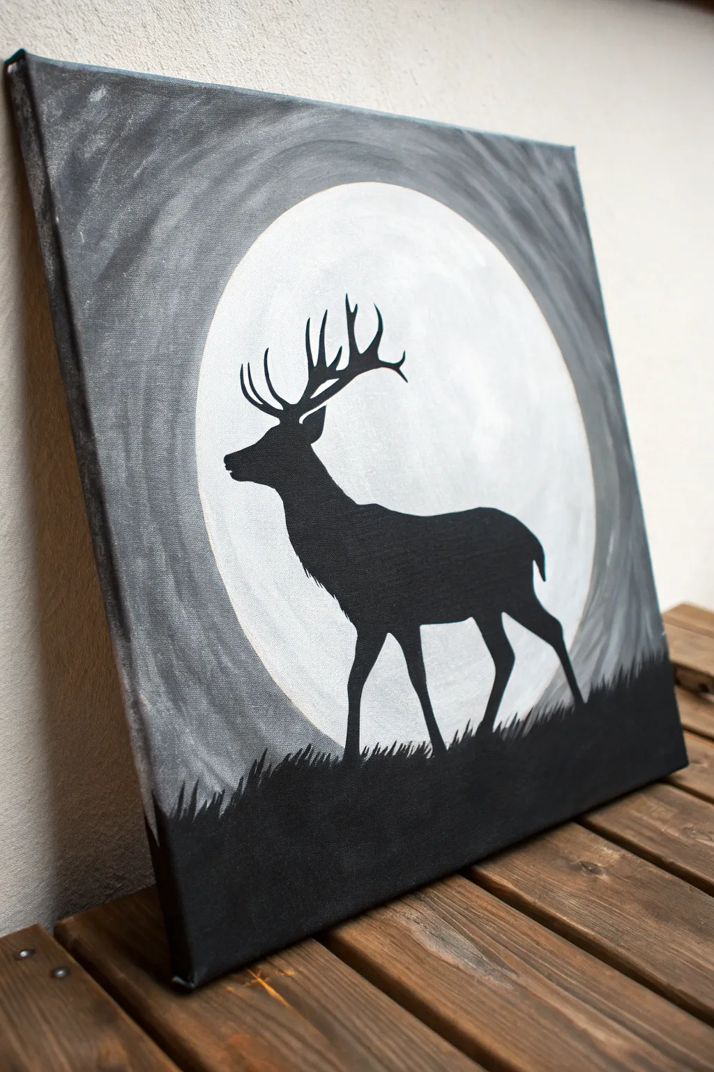 Minimalist deer silhouette with a soft spotlight glow for bold black and white canvas drama