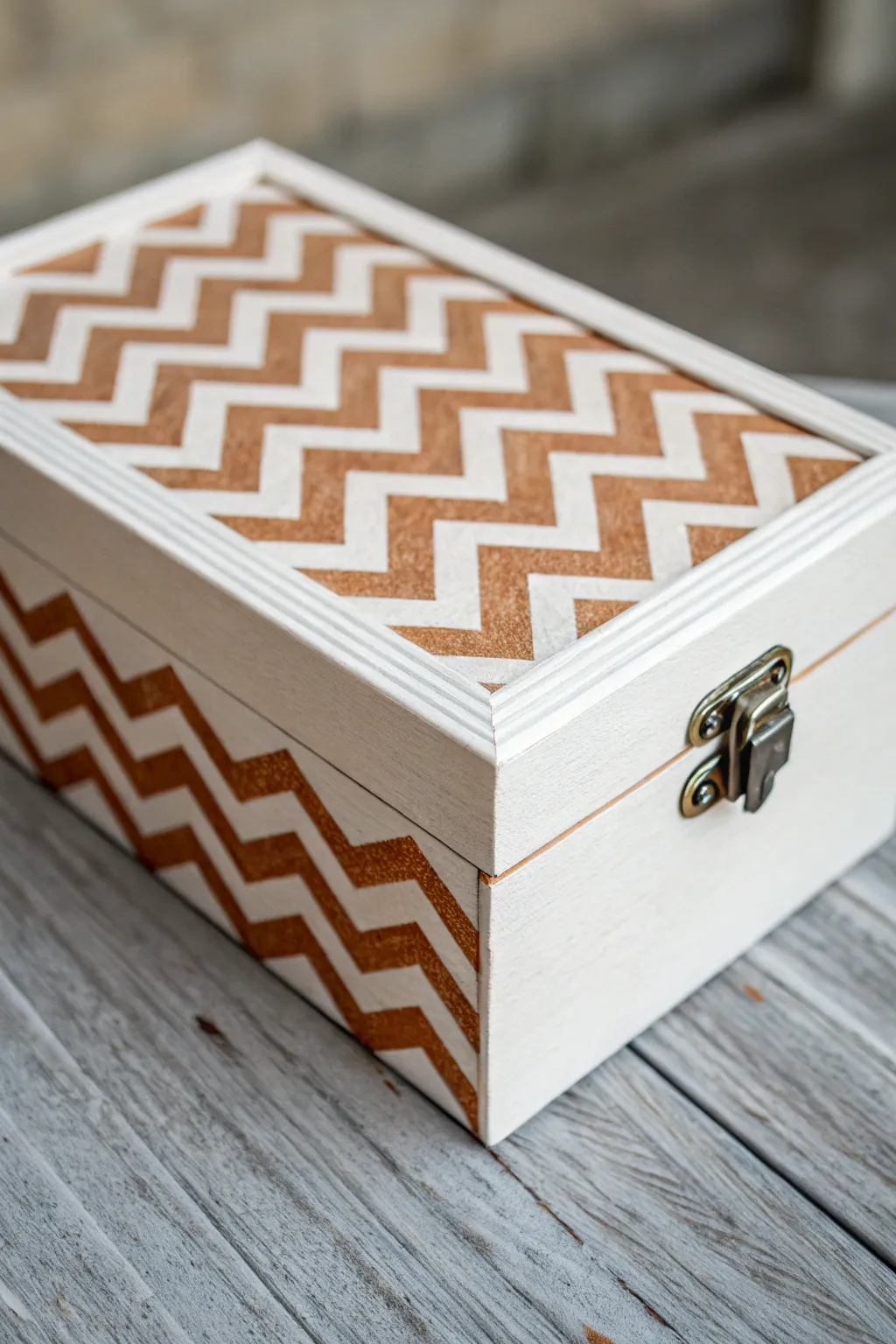Clean chevron zigzags on a matte painted wooden box for a minimalist boho aesthetic
