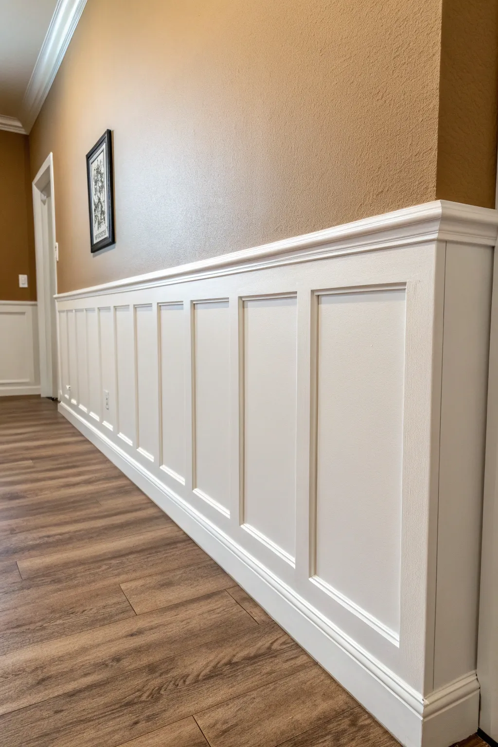 Elegant faux wainscoting: chair rail plus extra strip, all in one trim-forward color.