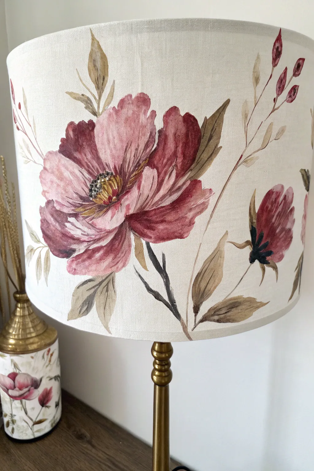 Oversized florals turn a simple drum shade into a soft, modern statement for any room.