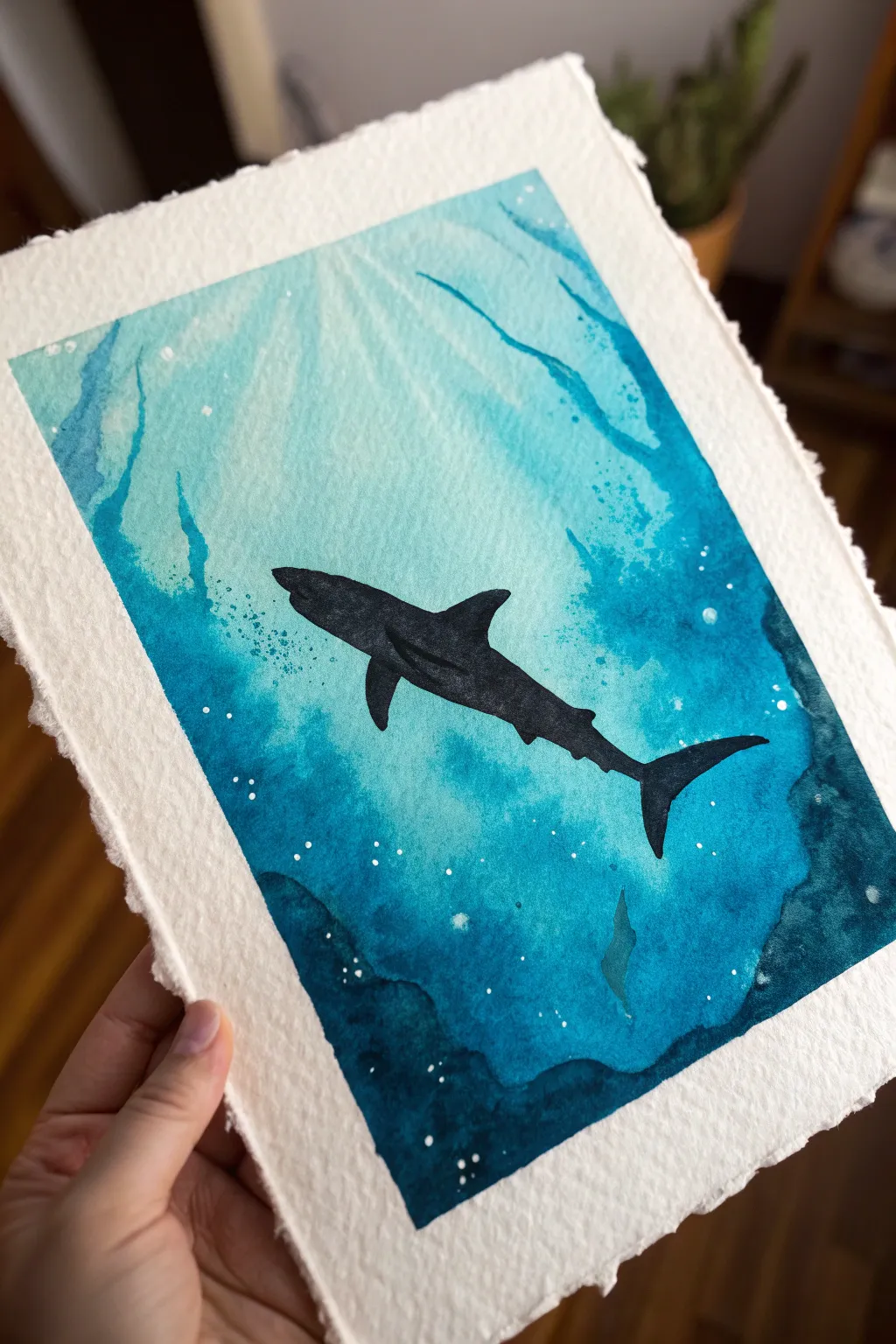 Crisp black shark silhouette over deep blue wash, minimalist ocean art with soft light texture.