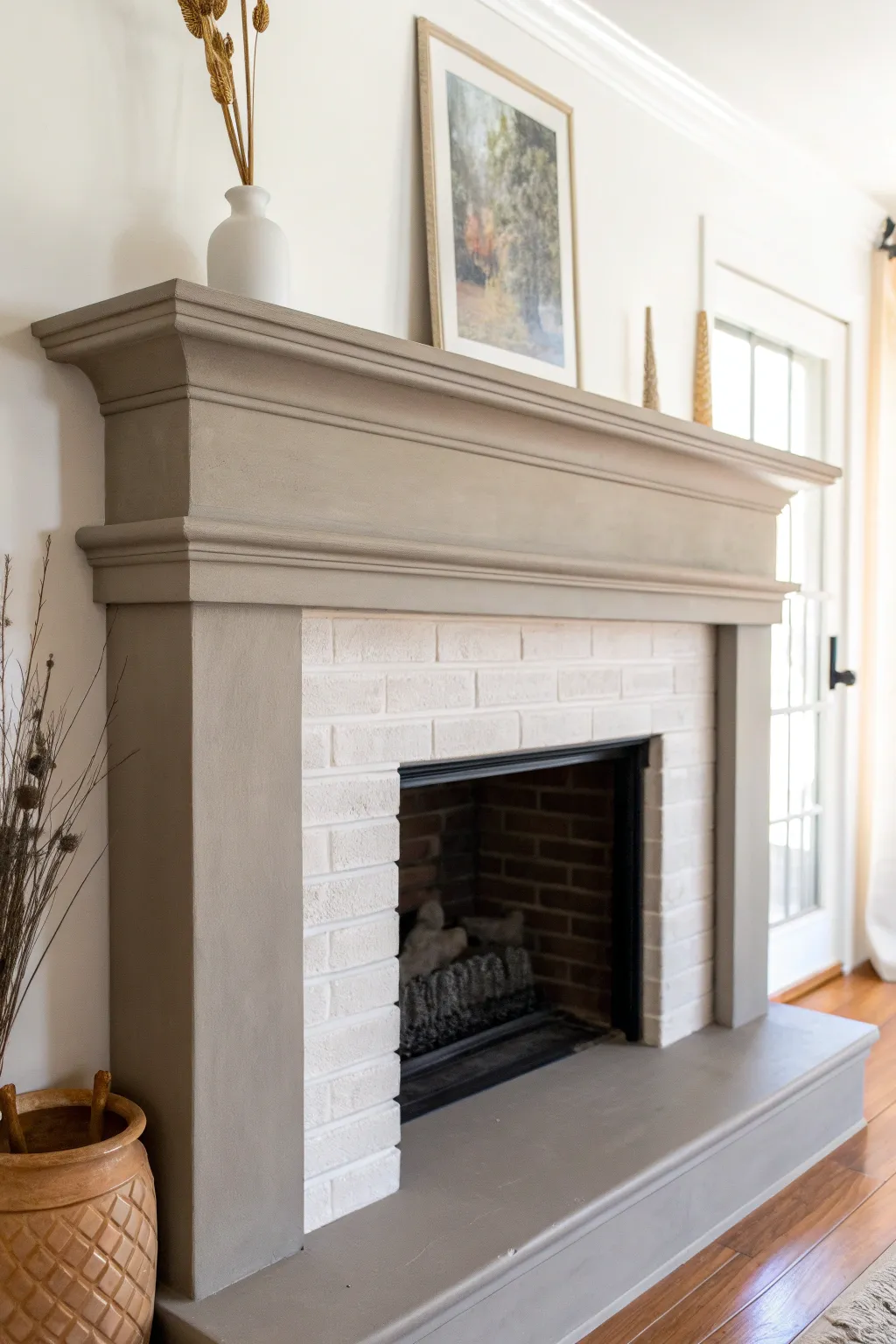 Matte greige mantel in soft daylight, minimal boho decor, and a calm contemporary Scandinavian feel