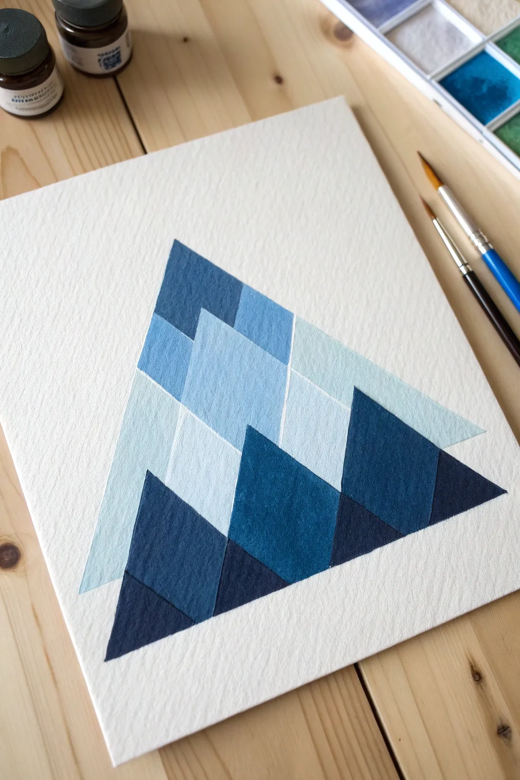 Create depth with this stunning geometric mountain painting idea, perfect for beginners wanting a modern look.