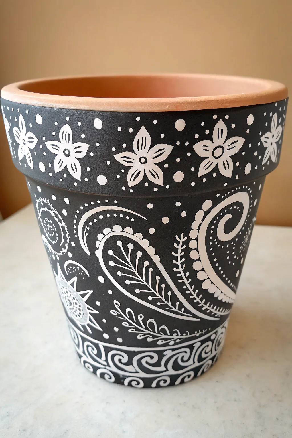 Modern black-and-white doodle pot design for minimal boho interiors, crisp and craft-forward.