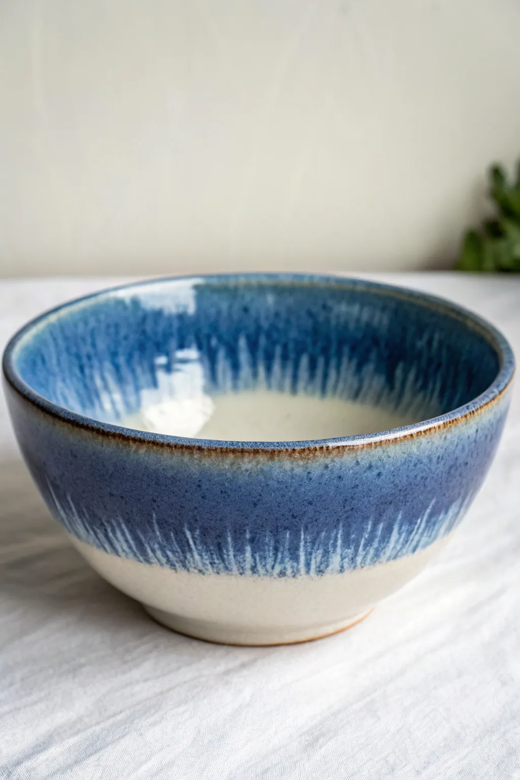 Minimal ombre dip-dye bowl with a deep-to-pale fade that makes the glaze the focal point.