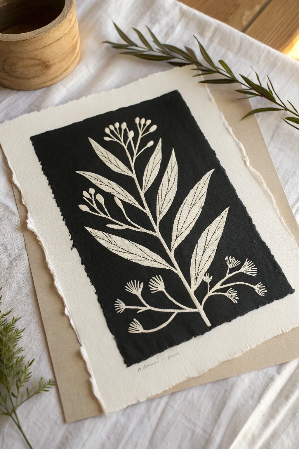 Bold negative-space relief print with carved white linework on black ink for striking contrast