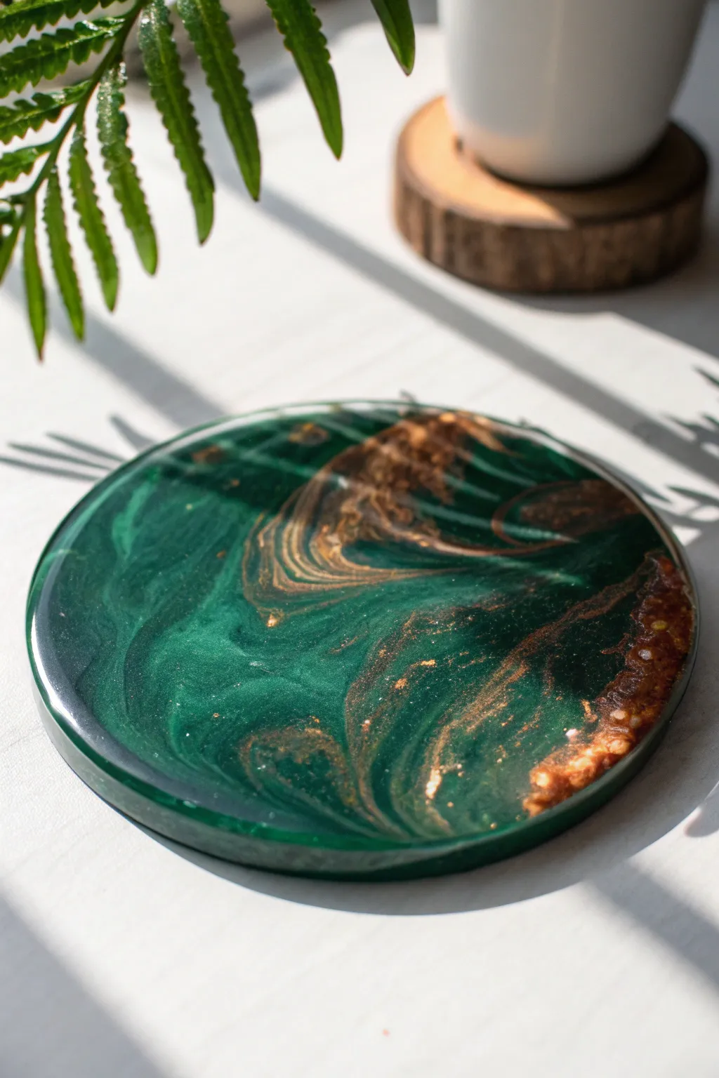 Emerald resin meets copper shimmer for a luxe coaster palette with modern minimalist warmth.
