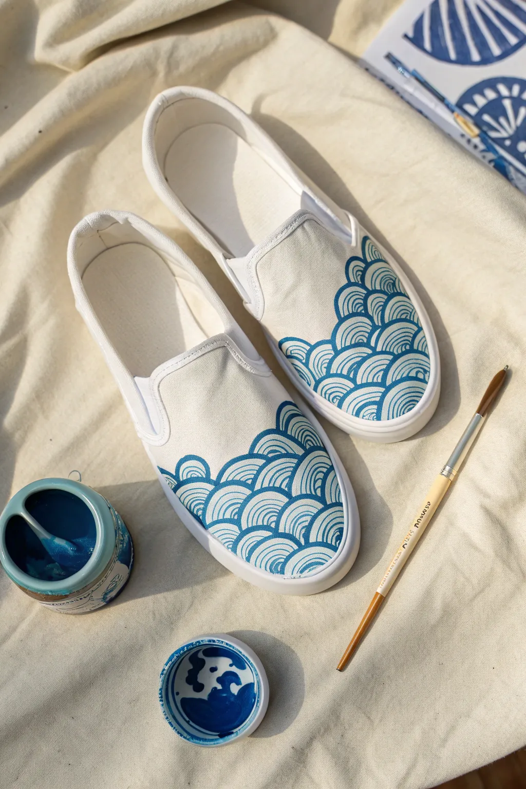 Simple ocean wave lines turn plain white shoes into a calm, coastal pattern with minimal effort
