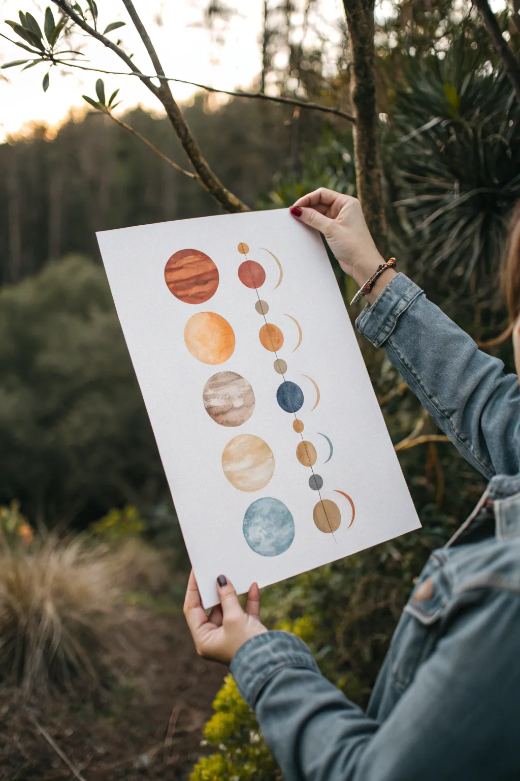 Minimal solar system lineup with grayscale moon phases, a calm Scandinavian-boho painting idea