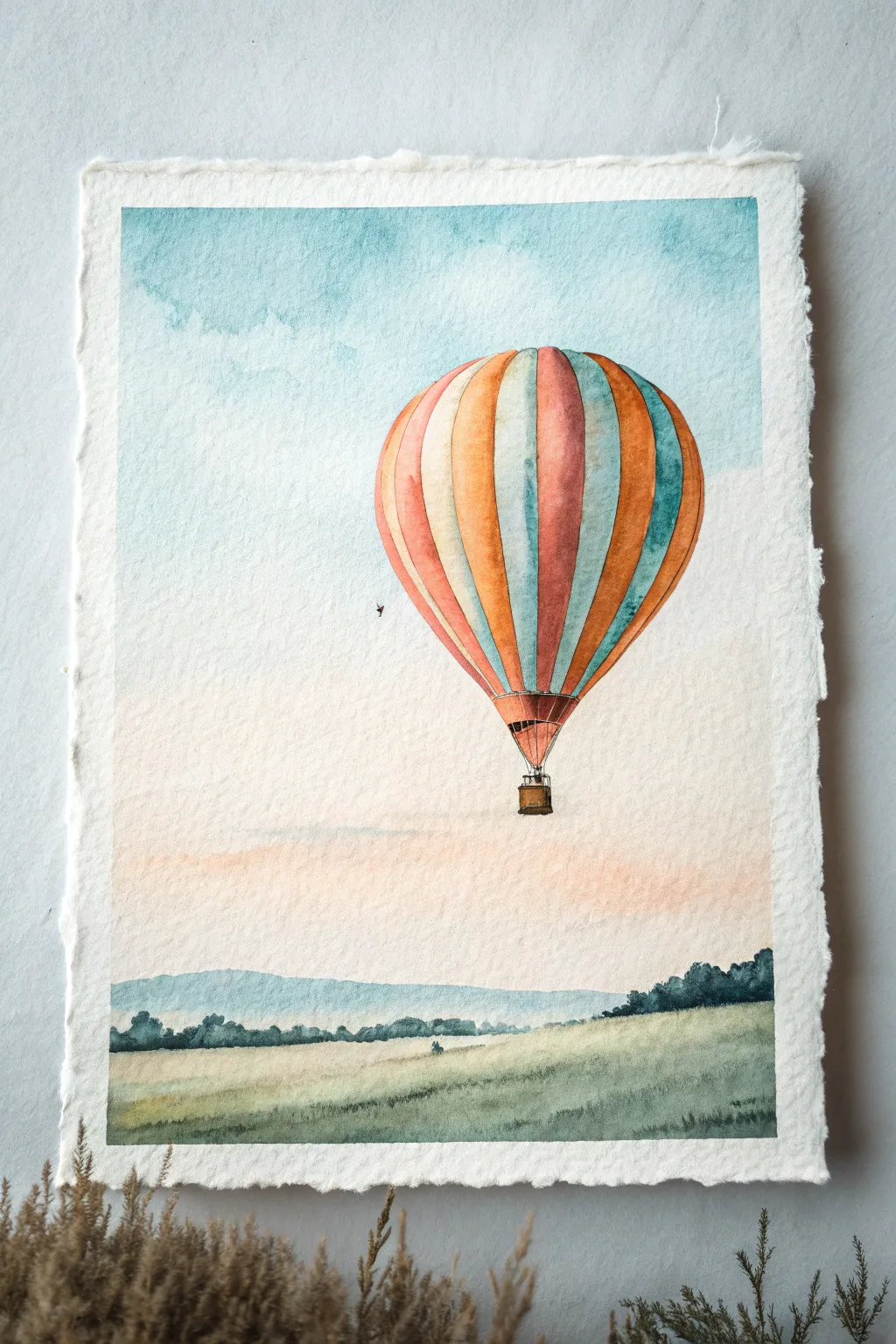 Cheerful watercolor hot air balloon mini scene in soft sky wash, perfect minimalist practice.
